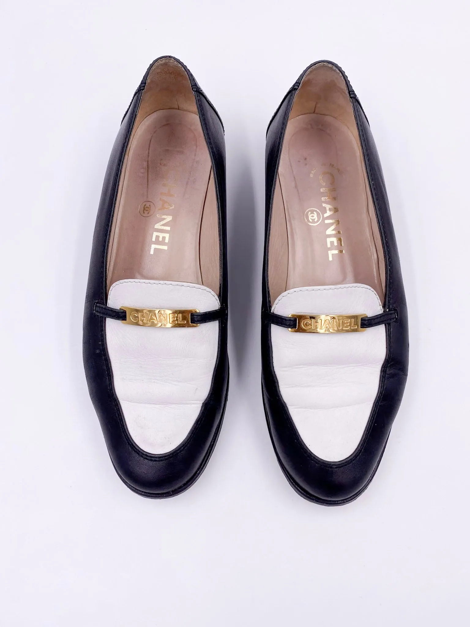 Chanel Black/White Loafers with Gold Emblem