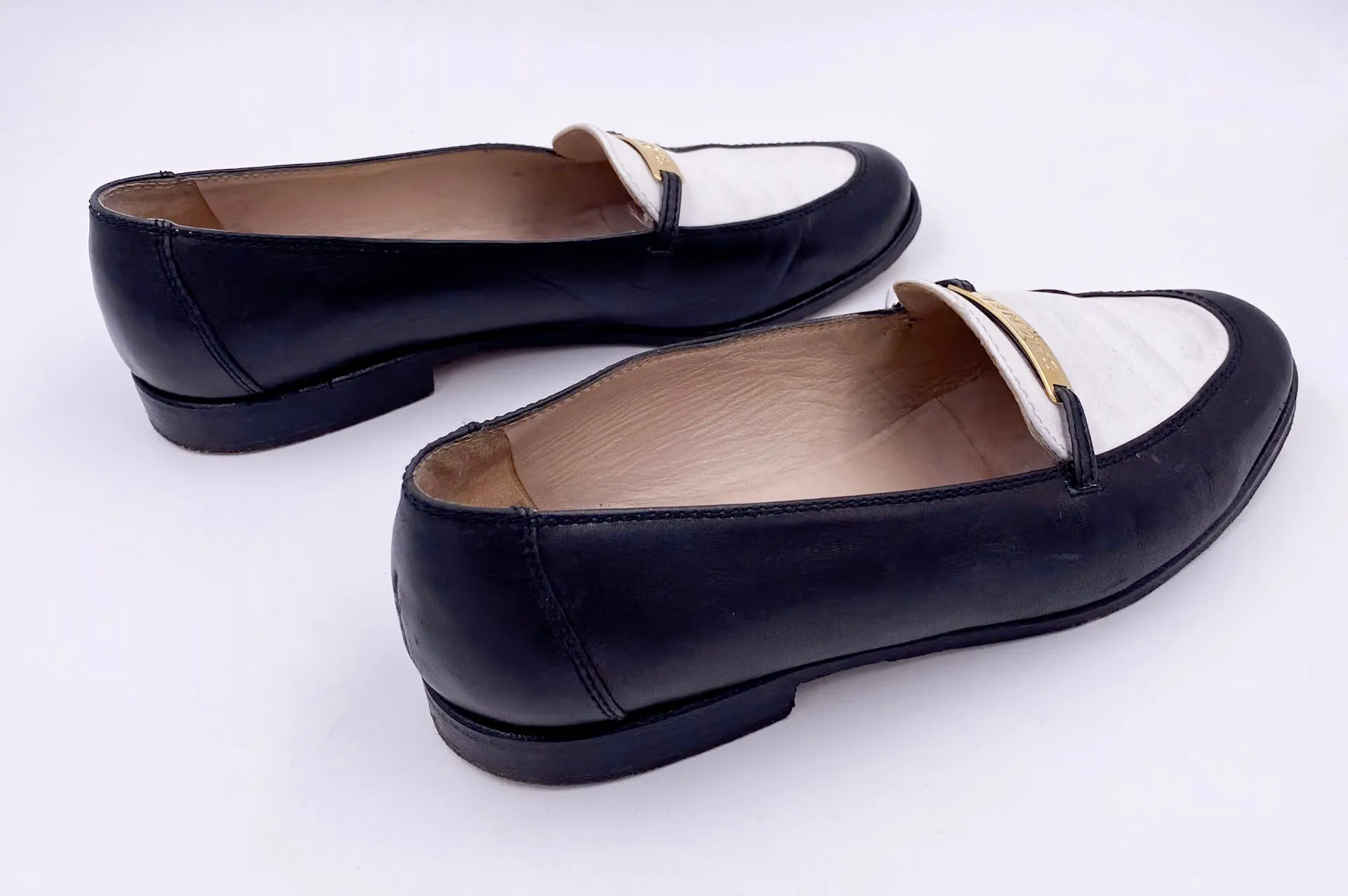 Chanel Black/White Loafers with Gold Emblem