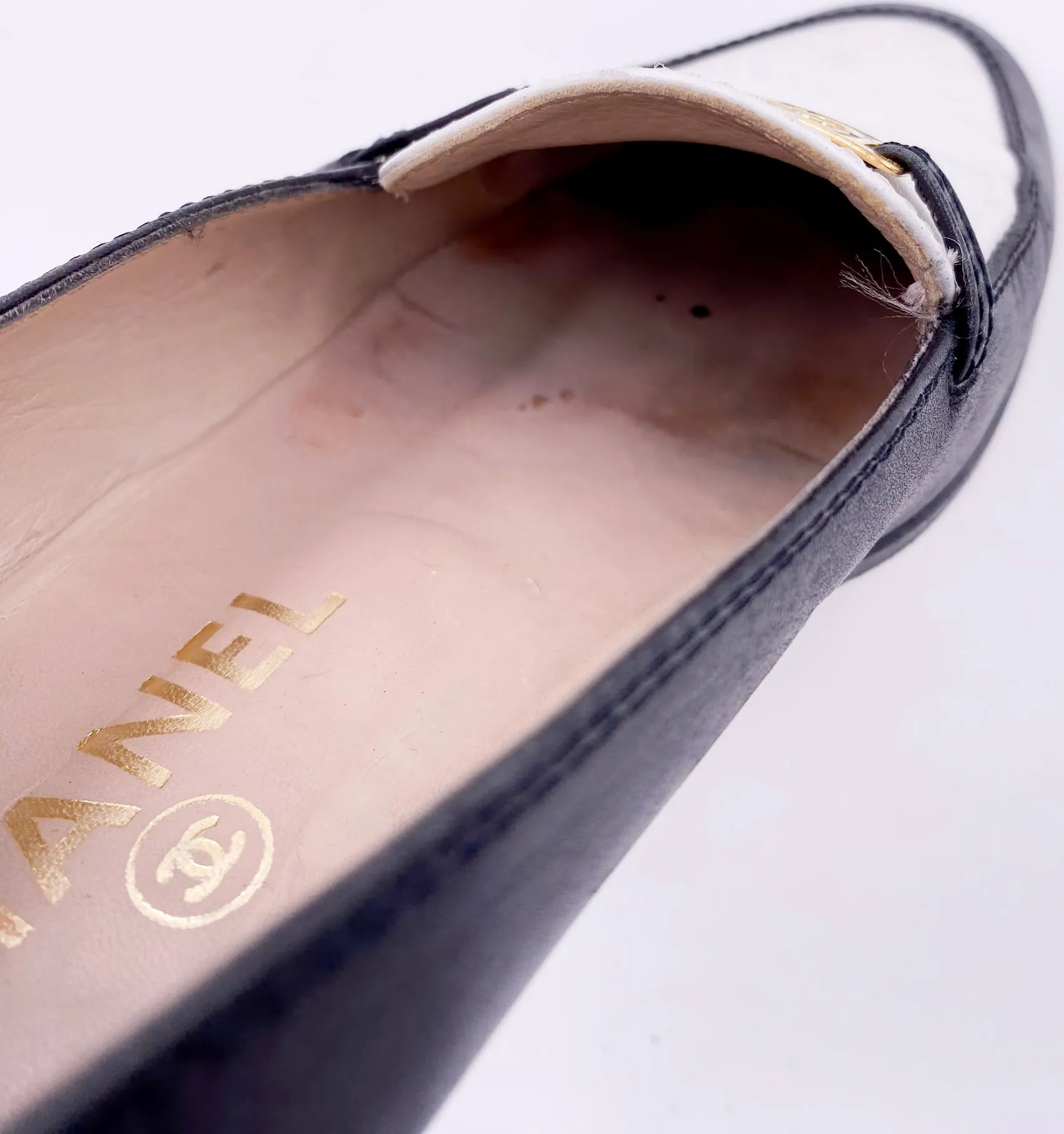 Chanel Black/White Loafers with Gold Emblem