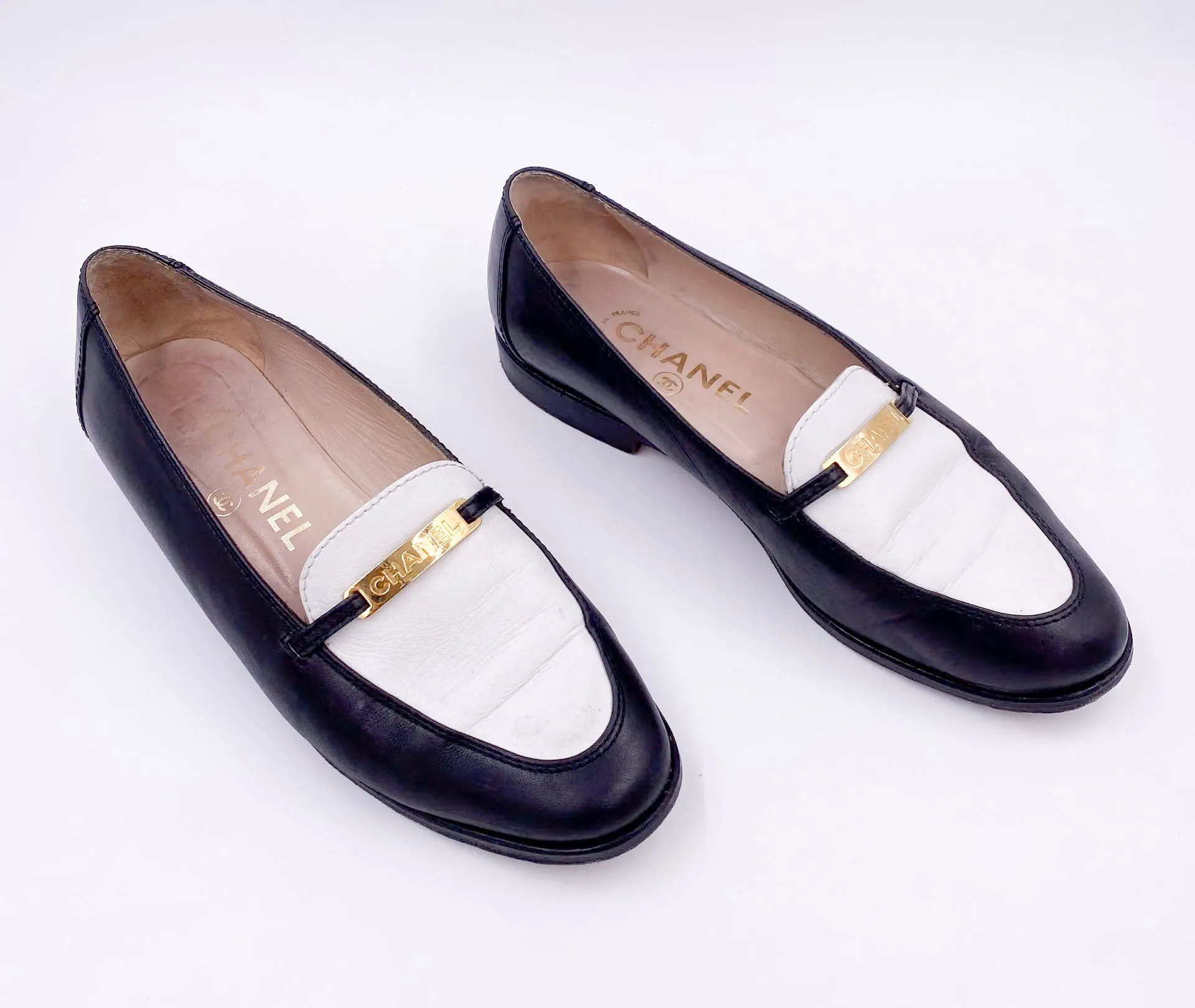 Chanel Black/White Loafers with Gold Emblem