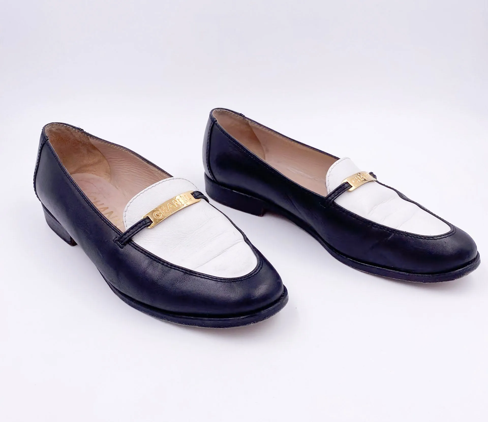 Chanel Black/White Loafers with Gold Emblem