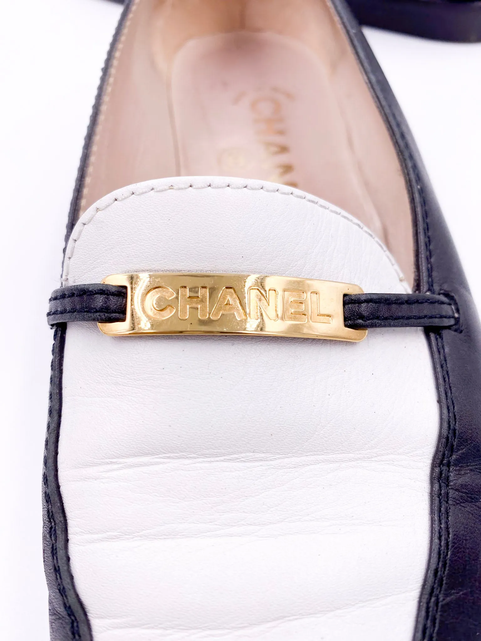 Chanel Black/White Loafers with Gold Emblem