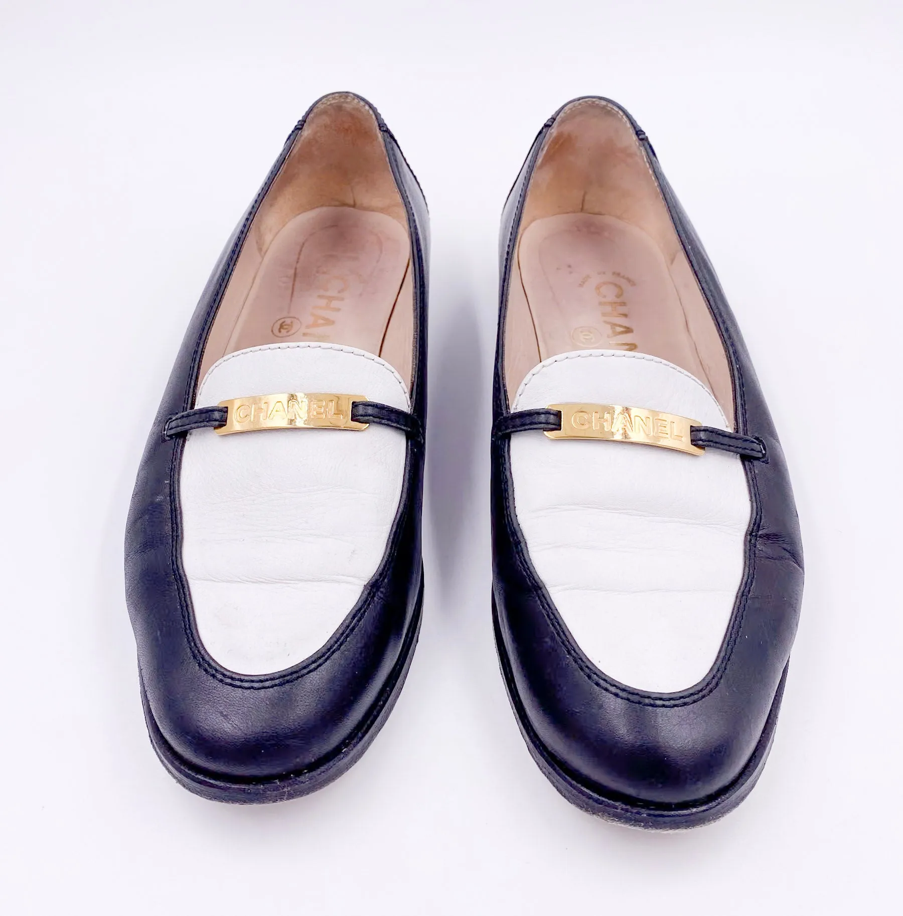 Chanel Black/White Loafers with Gold Emblem