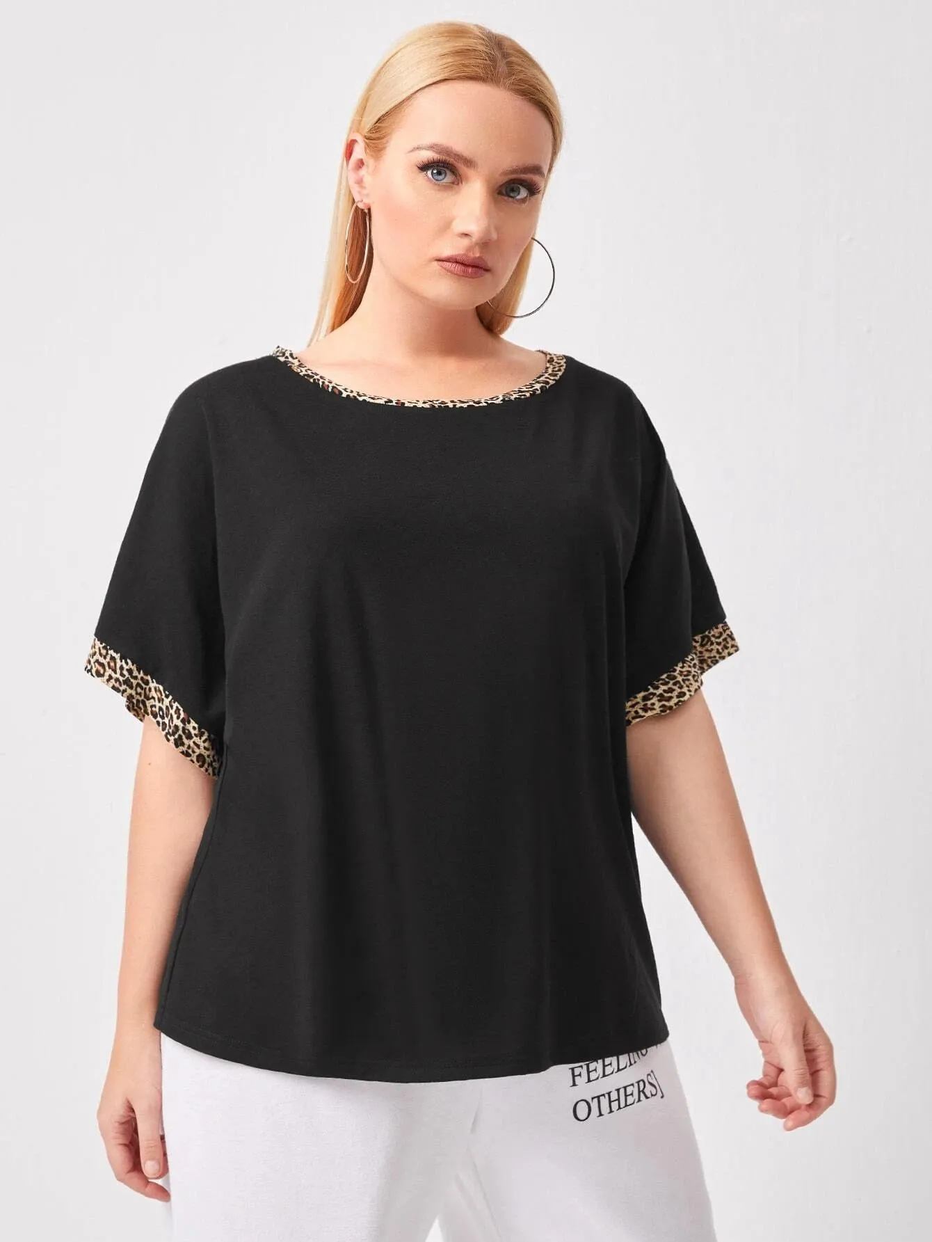 Round neck top with leopard trim collar and sleeves