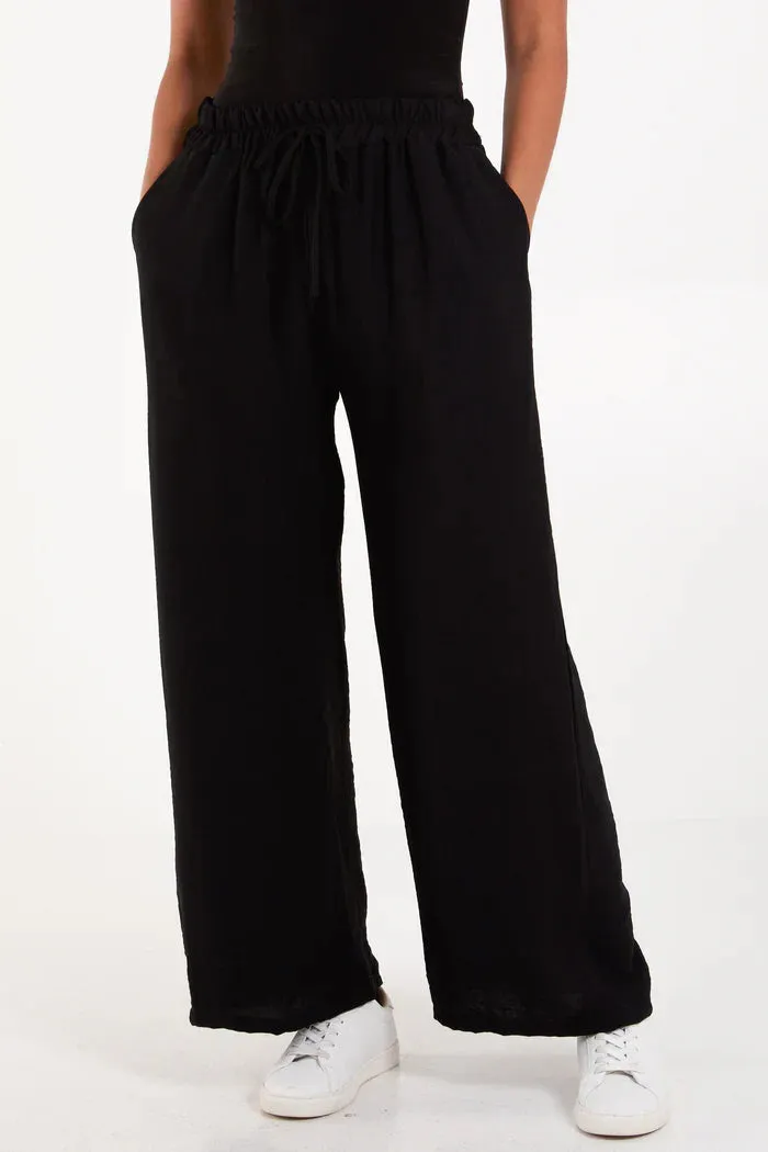 Wide Leg Crepe Trousers